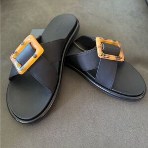 OluKai Lā'i Slide Sandals in Black